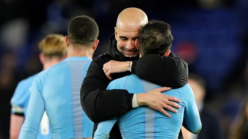 Pep Guardiola embraces Bernard Silva after City's win at Leicester