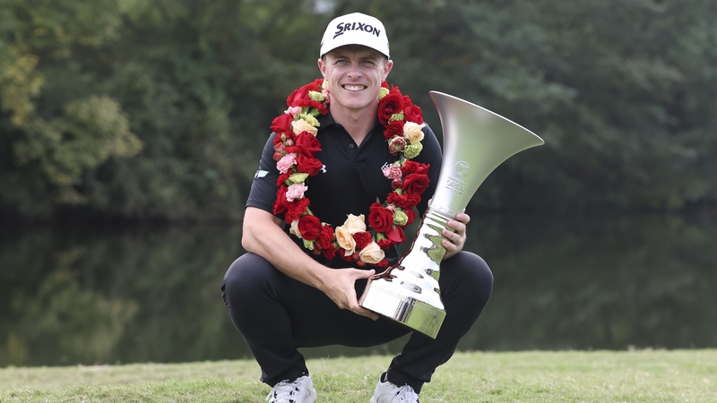 Conor Purcell with the trophy after winning the Hangzhou Open