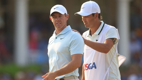 Rory McIlroy is consoled by his caddie Harry Diamond after making a bogey on the 18th hole during the final round of this year's US Open