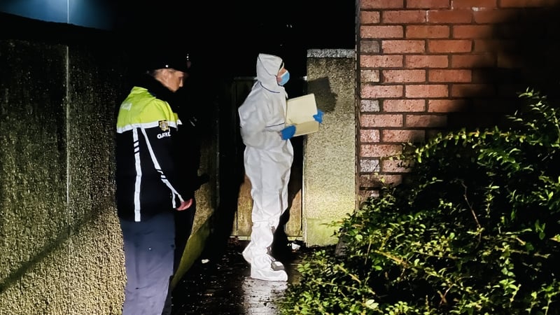 Garda Technical Bureau members examine the house where John O'Connor was found