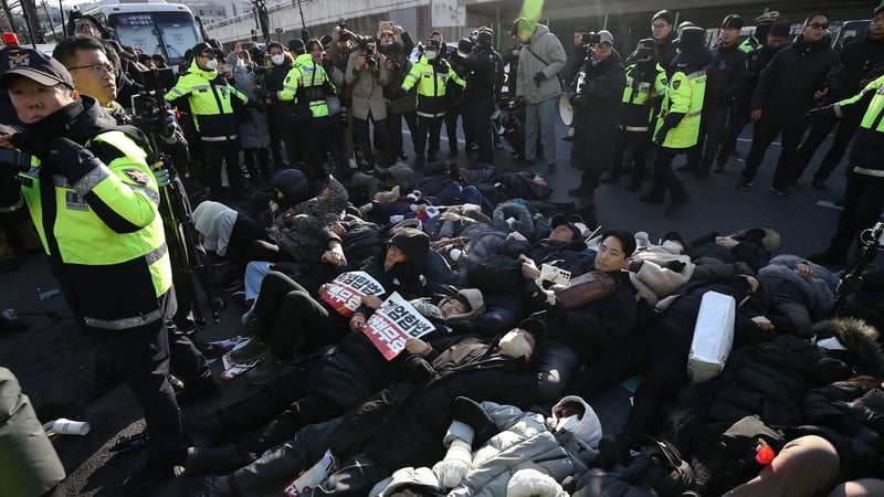 Pro-Yoon Suk Yeol supporters gather outside the official residence of impeached South Korean President