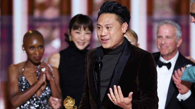 Director Jon M. Chu accepts the Cinematic and Box Office Achievement gong for Wicked