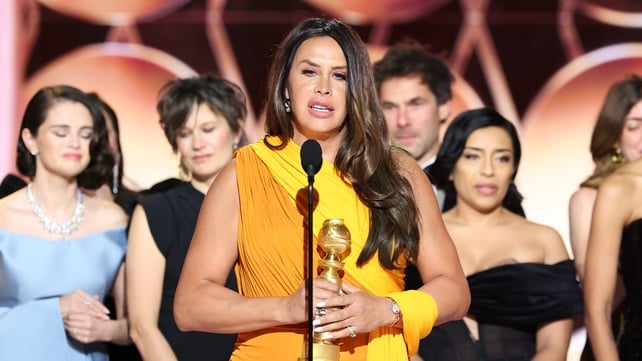 Karla Sofía Gascón accepting the Best Motion Picture Musical or Comedy award for Emilia Pérez