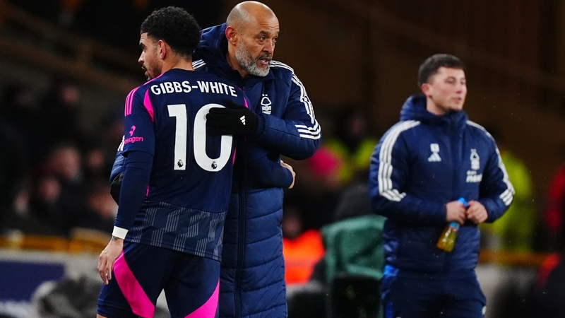 Nottingham Forest's Morgan Gibbs-White is embraced by manager Nuno Espirito Santo as he is substituted at Molineux