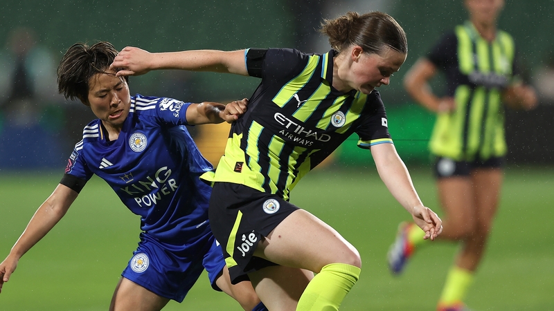 Manchester City's Eve O'Carroll (R) in action against Yuka Momiki of Leicester City during a pre-season friendly last August