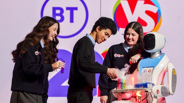 Twin sisters Ashlee and Aimee Keogh. from Tallaght Community School. with Hazem Ahmed. from Coláiste Phádraig CBS in Dublin, and robot 'Deirdre' who were on hand to launch the exhibition