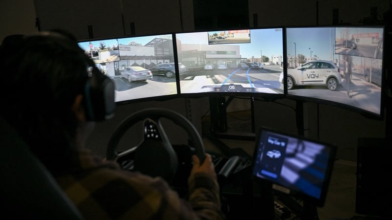 A remote driver steers an electric vehicle from Vay in a live demonstration of remote driving on city streets at CES