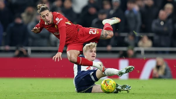 Lucas Bergvall scored shortly after avoiding a second yellow card for this late tackle on Kostas Tsimikas