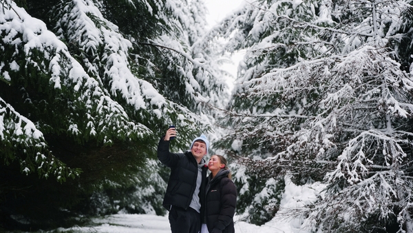 Eoghan Walsh, from Rathfarnham in Dublin, takes a selfie with his girlfriend Laoise Wickham on a walk to the Hell Fire Club in Dublin