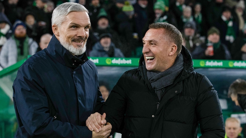 Celtic manager Brendan Rodgers shares a joke with Dundee United counterpart Jim Goodwin