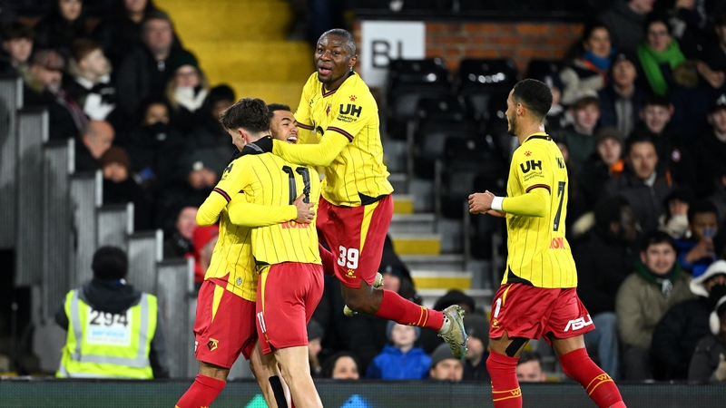 Rocco Vata is surrounded by his team-mates after another goal