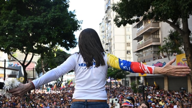 Venezuelan opposition leader Maria Corina Machado addresses supporters during a protest on the eve of the presidential inauguration
