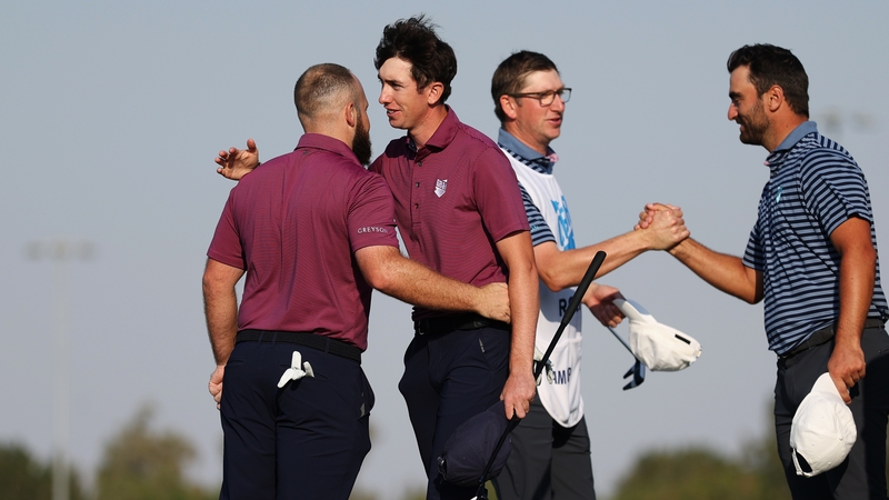 Tom McKibbin and Tyrrell Hatton celebrate after winning their fourball match