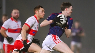 Eoin Kennedy of Cuala in action against Kevin Banks of Coolera-Strandhill