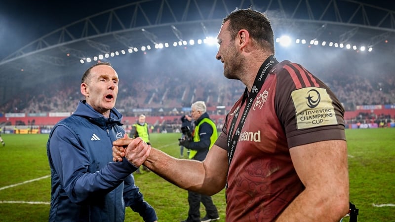 Munster interim head coach Ian Costello congratulates Player of the Match Tadhg Beirne