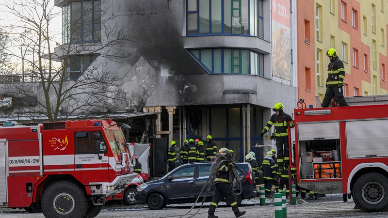 Firefighters at the scene of the restaurant "U Kojota" damaged by the blaze in the city of Most