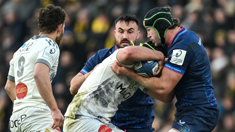 Leinster's Caelan Doris halts Grégory Alldritt during the hard-fought win