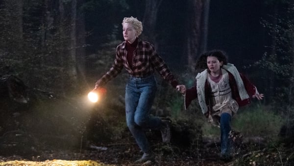 Charlotte (Julia Garner) and Ginger (Matilda Firth) in Wolf Man