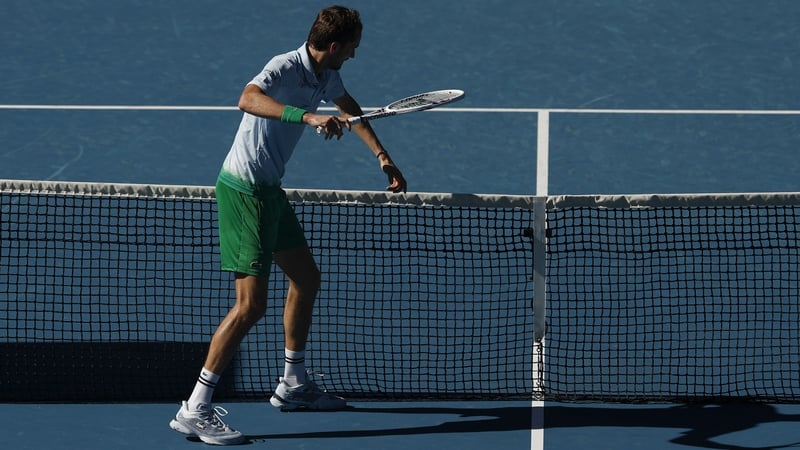 Daniil Medvedev smashes a TV net camera after losing the third set against Kasidit Samrej
