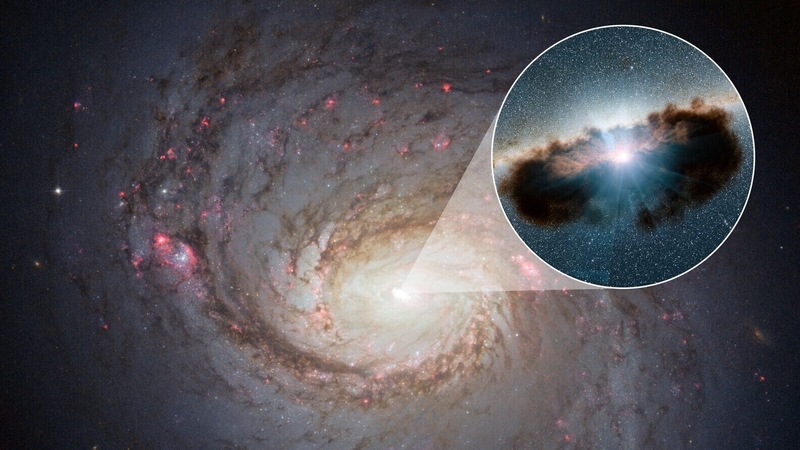 Undated handout image issued by NASA of a supermassive black hole hidden behind gas and space dust