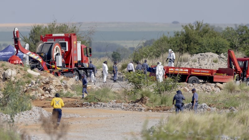 Rescuers at the scene of the disaster in the town of Stilfontein