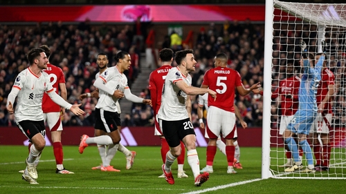 Diogo Jota wheels away in celebration after equalising for Liverpool