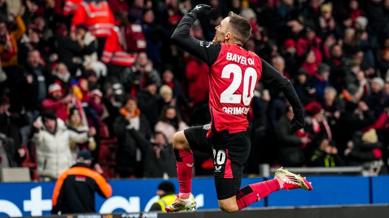 Bayer Leverkusen's Alex Grimaldo celebrates his team's first goal