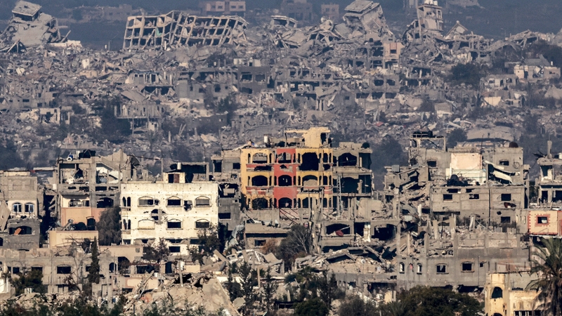An image taken from the Israeli side of the border with Gaza shows destroyed buildings in the north of the enclave