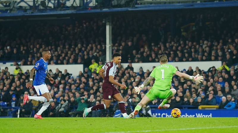 Ollie Watkins firing past Jordan Pickford