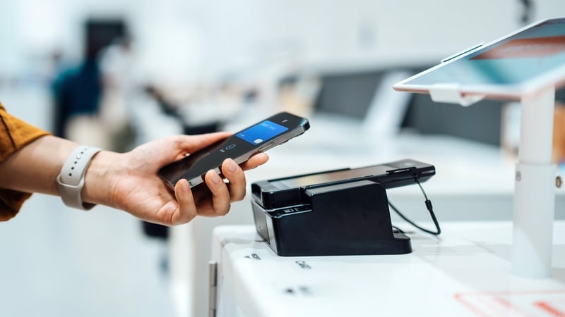 'Consumers now tend to spend less when they get digital payment notifications flashing up an amount on their phone.' Photo: Getty Images