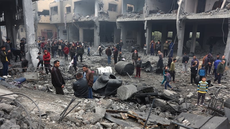 People check the rubble of buildings hit in Israeli strikes on Wednesday night in Jabalia in northern Gaza