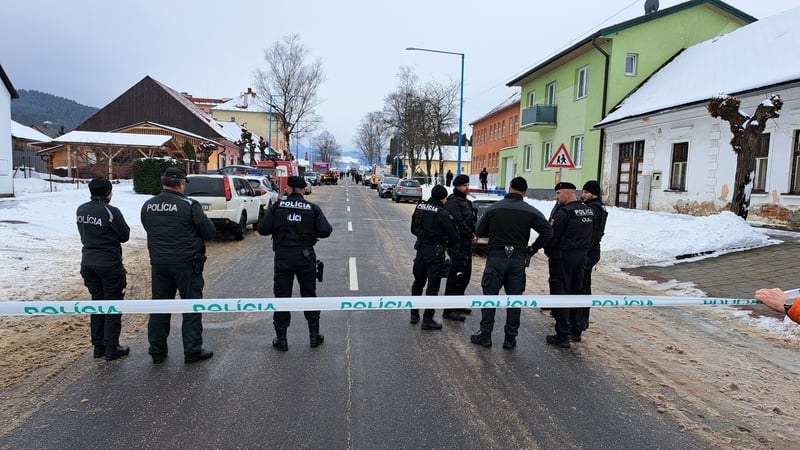 Police pictured outside a school in the town of Spisska Stara Ves in Slovakia where an 18-year-old killed a student and teacher