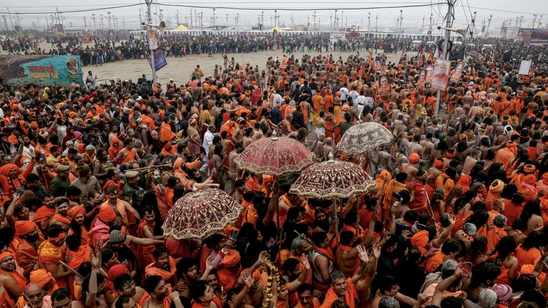 Naga Sadhus or Hindu holy men arrive to take a dip in Sangam, for Shahi Snan or 'royal bath', during the Maha Kumbh Mela festival, in Prayagraj, India
