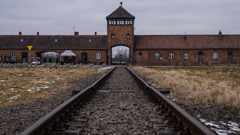 A view of the main entrance and train track at the former Auschwitz-Birkenau site
