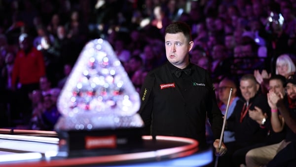 Kyren Wilson enters the arena ahead of his quarter-final