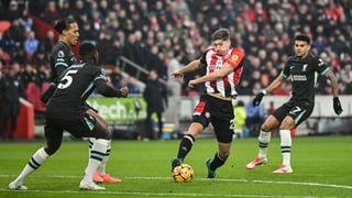 Vitaly Janelt attacks the Liverpook defence early in the game