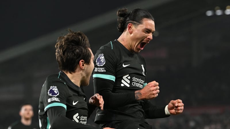 Darwin Nunez (R) celebrates his second goal