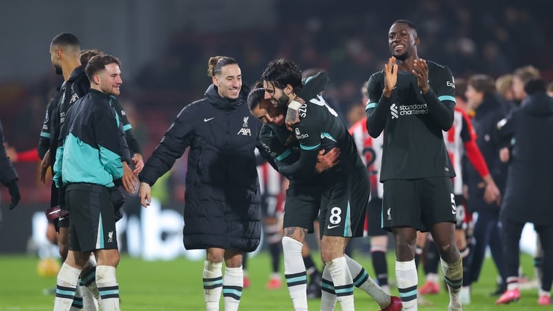 Liverpool players celebrate after the game