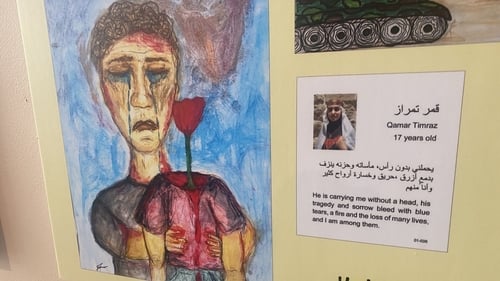 The art exhibition showcases artwork drawn by children in Gaza