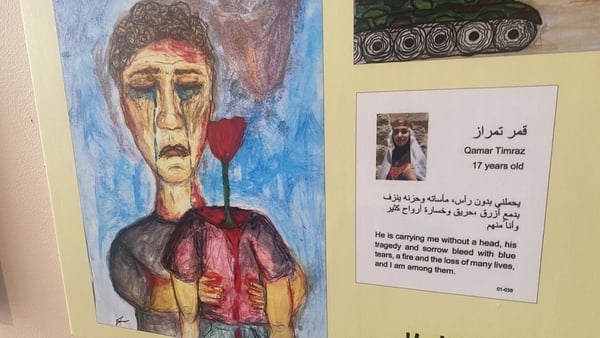 The art exhibition showcases artwork drawn by children in Gaza