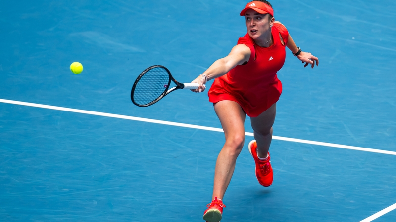 Elina Svitolina lunges to make a backhand in her win over Veronika Kudermetova