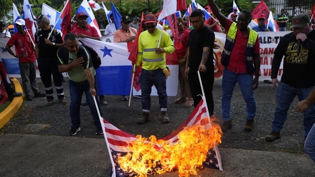 Demonstrators burned US flags during a protest against the inauguration of Mr Trump outside the residence of the US ambassador in Panama City. During his inaugural address, Mr Trump said the United States would be 'taking back' the Panama Canal