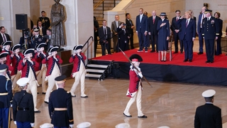 The US Army Old Guard Fife and Drum Corps parade in front of President Donald Trump during Inauguration ceremonies