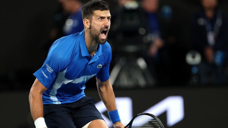 Novak Djokovic celebrates converting match point