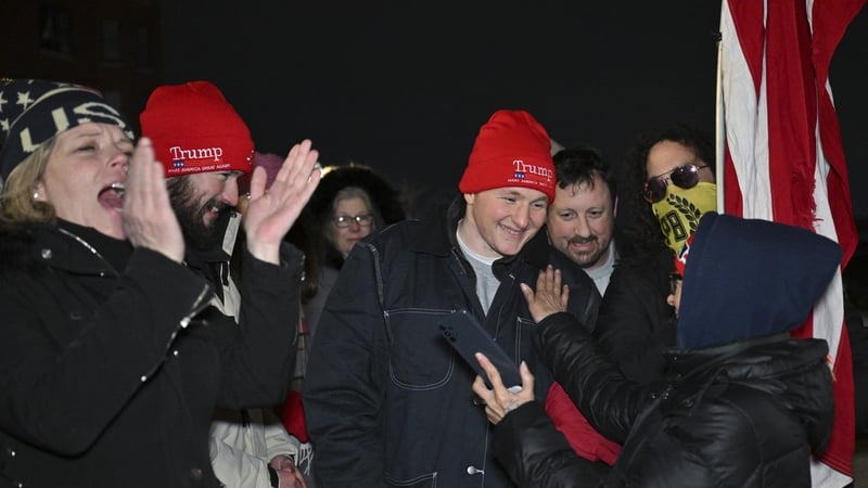 Gregory Purdy (C), a January 6 defendant, is surrounded by friends after his release from the DC Central Detention Facility