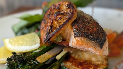 Trisha Lewis' baked salmon tray bake with chimichurri
