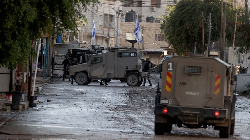 Israeli military vehicles and construction equipment patrol the streets and alleys as the Israeli army continues its attacks