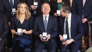 Fine Gael ministers share a joke after receiving their seals of office