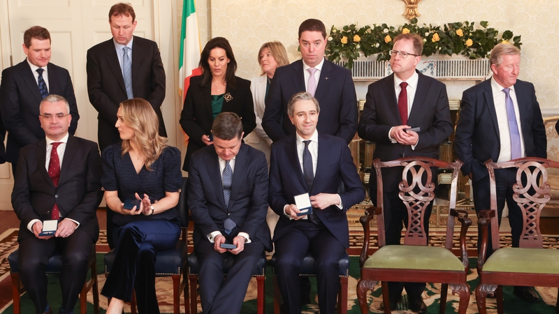 Ministers preparing for a photo after receiving their seals of office