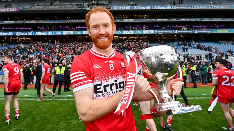 Conor Glass with the Division 1 league trophy